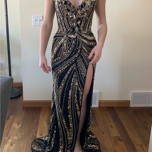 Ashley Lauren 11235 Black and Gold Sleeveless Prom Gown with Plunge Neckline